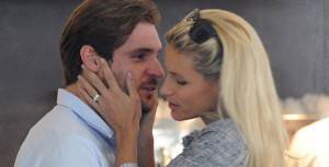 EXCLUSIVE: Michelle Hunziker and Tomaso Trussardi share kisses and hugs at "Trussardi Cafe" in Milan.